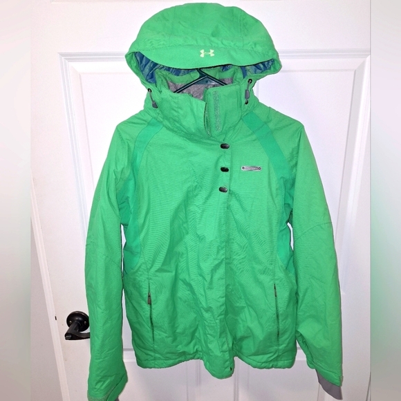 An Under Armour green billed hooded lined coat in a men's small with pit vents. - Picture 1 of 11